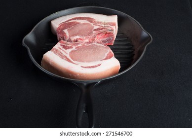 pork meat in a frypan