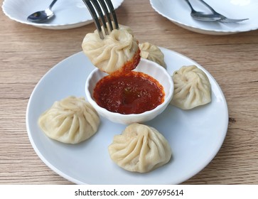 Pork Momo, Served Pan Fried Eat With Chilli Paste Sauce, Bhutan Food.