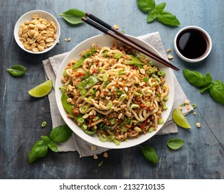 Pork, Peanut Udon Noodles With Pak Choi, Mangetout And Red Chili. Asian Food