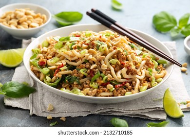 Pork, Peanut Udon Noodles With Pak Choi, Mangetout And Red Chili. Asian Food