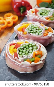 Pork Pinwheels Stuffed With Fresh Asparagus, Peppers, And Mozzarella Cheese.