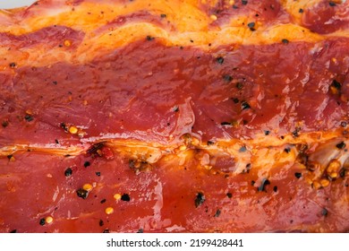 Pork Ribs. Raw Meat. Raw Pork Ribs In Marinade With Spices, Rosemary, Tomato Sauce And Garlic. Texture Barbecue Concept. Mock Up.