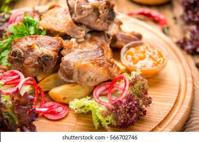 Pork Ribs With Southern Fries. Beautiful And Tasty Food On A Plate