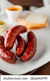 Pork Sausage. Barbecue Pork Sausage Links Served With Classic Bbq Sides Mac N Cheese, Cornbread, Brussels Sprouts, Coleslaw & Beer. Classic Traditional Texas Meats & Side Dishes.