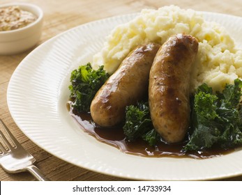 Pork Sausage And Mash With Curly Kale