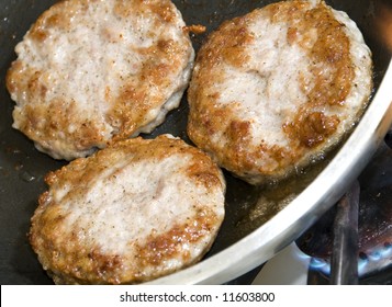  Pork Sausage Patties Cooking In Frying Pan