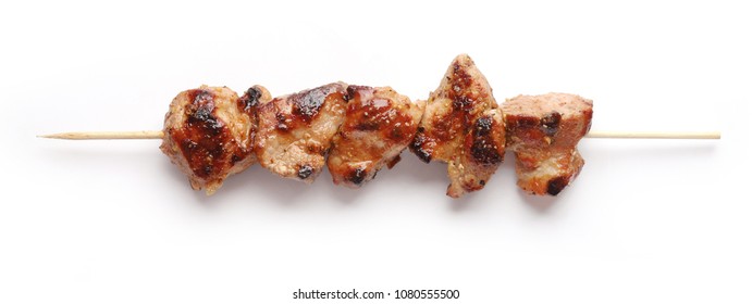 Pork shish kebab isolated on white background, top view