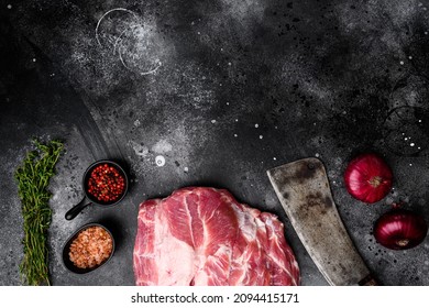 Pork shoulder fresh raw meat set, with ingredients and herbs , with old butcher cleaver knife, on black dark stone table background, top view flat lay, with copy space for text