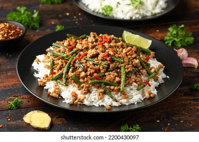 Pork Stir Fry with Green Beans, rice, garlic, chili and ginger. Asian food. - Shutterstock ID 2200430097