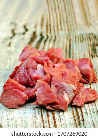 Pork surrounded by rustic background