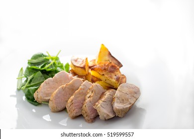 Pork Tenderloin With Potatoes And Baby Spinach