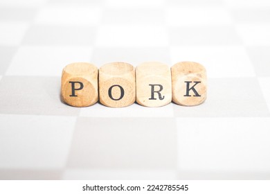 Pork word on wood block - Shutterstock ID 2242785545