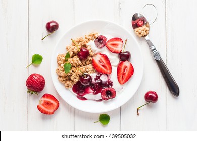  Porridge. Healthy breakfast with yogurt, muesli and berries. Top view, flat lay  - Powered by Shutterstock