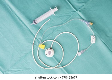Port a catheter or central venous port insertion, puncture at chest wall to aorta artery a medical device as silicone cartridges ,has flexible tube with needle and syringe.                            