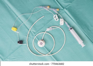 Port a catheter or central venous port insertion, puncture at chest wall to aorta artery medical device as silicone cartridges ,has flexible tube with syringe and needle.                            