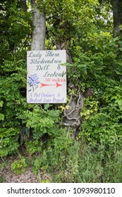 Port Chalmers, Dunedin, New Zealand-December 11,2016: Sign Posted For Directions To The Lady Thorn Rhododendron Dell In Dunedin, New Zealand