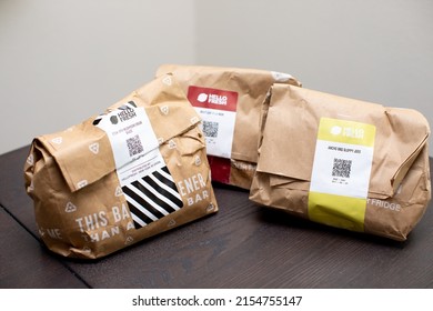 Port Charlotte, Florida - May 10, 2022: Three Brown Paper Bags Filled With Delicious Meal Preparation For Dinner Or Lunch From Hello Fresh Subscription Weekly Plan 