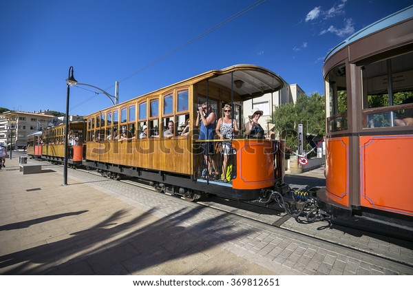 Port De\
Soller, Spain, August 13, 2015: Tramway connecting town to Soller\
opened in 1913 and is about 5 km long. Some its original,\
1913-built cars are still in service on the\
line.