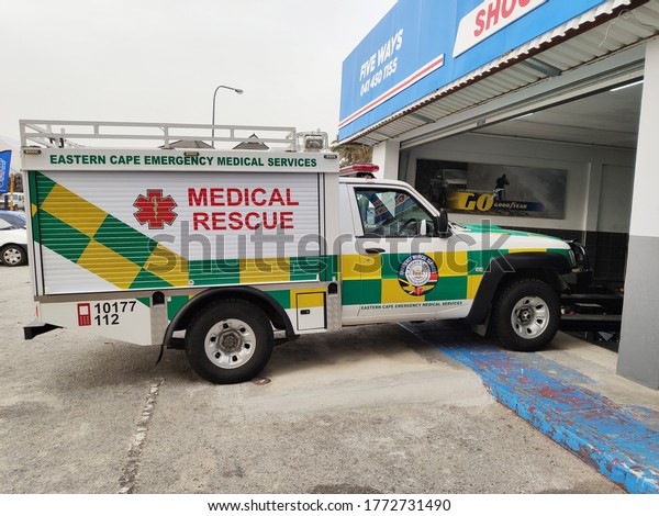 Port Elizabeth, South Africa - July 09, 2020: An Eastern\
Cape Medical Rescue vehicle going into a mechanical workshop for a\
service. 