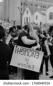 Port Elizabeth, South Africa - March 2019: A Woman Being Embraced By A Male Protester At A Protest To Remember Women And Children Who Were Raped And Killed In South Africa. Gender Based Violence.