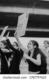 Port Elizabeth, South Africa - September 14th, 2019: A Group Of Young Female Students Holding Banners At A Protest To Remember Women Who Were Raped And Killed In South Africa.