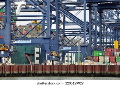 Port Of Felixstowe, Suffolk, United Kingdom, September 21, 2022. Large Bulk Carrier Container Ship In Dock. Being Loaded By Cranes. Illustrates International Trade, Economic Growth, Globalisation