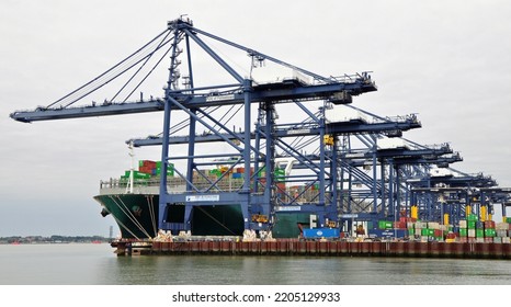 Port Of Felixstowe, Suffolk, United Kingdom, September 21, 2022. Large Bulk Carrier Container Ship In Dock. Being Loaded By Cranes. Illustrates International Trade, Economic Growth, Globalisation