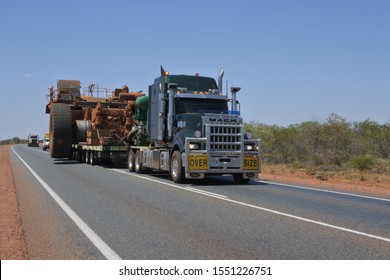 PORT HEDLAND - OCT 10 2019:Large Truck Carry Oversize Haul Rigid Dump Truck In Western Australia Outback.Load Shifting Is The Responsibility Of The Shipper, Motor Carrier, Driver And The Receiver.