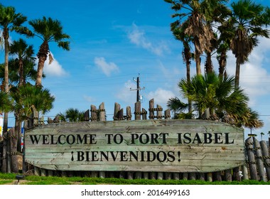 Port Isabel, Texas , USA - June 1st 2021: Welcome to Port Isabel sign welcoming beach vacation travelers as you enter onto South Padre Island , Texas , USA 