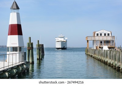 PORT JEFFERSON, NY - April 6, 2015: Auto Ferry arriving at port. The ferry 'Park City' arrives at Port Jefferson, New York from Bridgeport Connecticut. The boat carries 95 vehicles and 1000 passengers