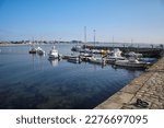 Port Louis, Bretagne, France : Beautiful picture of the port of Port Louis, near Lorient. Calm and blue sea, beautiful sky very sunny, old stone dike