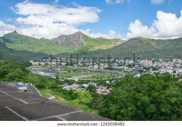 Port Louis, Mauritius - 18\
April, 2018: Beautiful view of Champ de Mars Racecourse from\
Citadel Fort Adelaide. It\'s the second oldest racecourse in the\
world.