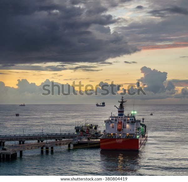 Port Louis, Mauritius - February 13: Fuel\
carrier vessel at the terminal in Port Louis on February 13, 2016 \
in Port Louis, Mauritius.