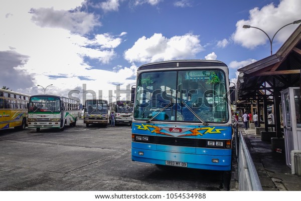 Port Louis, Mauritius - Jan 4, 2017.\
Local buses at station in Port Louis, Mauritius. Port Louis is the\
country economic, cultural and political\
centre.