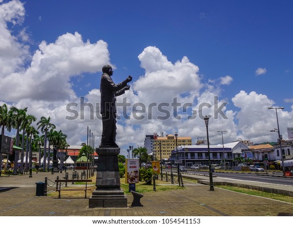 Port Louis, Mauritius - Jan 4,\
2017. A hero monument at main square of Port Louis, Mauritius. Port\
Louis is the country economic, cultural and political\
centre.