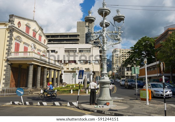 PORT LOUIS, MAURITIUS - NOVEMBER 29, 2012: View to the\
street with pedestrian crossing in downtown Port Louis, Mauritius. \
