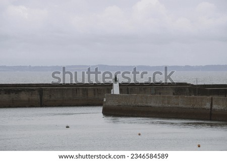 Port Maria lighthouse and pier in Quiberon, Brittany, France
