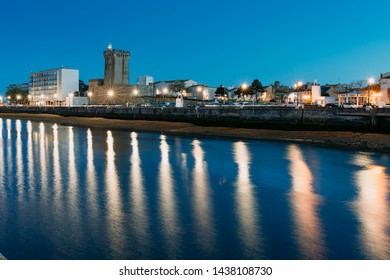 Port and marina of Les Sable D'olonne, France at dusk with reflections in the water - Shutterstock ID 1438108730