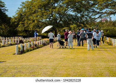 PORT MORESBY, PAPUA NEW GUINEA - FEBRUARY 7, 2021: Australia Defence Force Families Visiting Bomana War Cemetery.