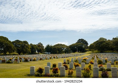 PORT MORESBY, PAPUA NEW GUINEA - FEBRUARY 7, 2021: Australia Defence Force Families Visiting Bomana War Cemetery.