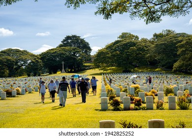 PORT MORESBY, PAPUA NEW GUINEA - FEBRUARY 7, 2021: Australia Defence Force Families Visiting Bomana War Cemetery.