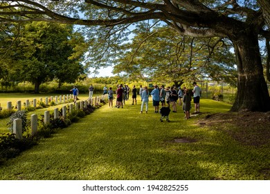 PORT MORESBY, PAPUA NEW GUINEA - FEBRUARY 7, 2021: Australia Defence Force Families Visiting Bomana War Cemetery.