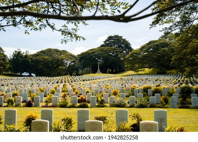 PORT MORESBY, PAPUA NEW GUINEA - FEBRUARY 7, 2021: Australia Defence Force Families Visiting Bomana War Cemetery.