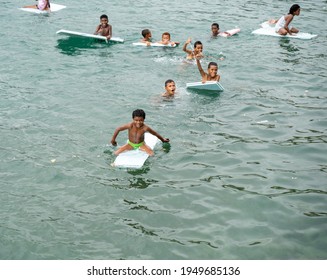 PORT MORESBY, PAPUA NEW GUINEA - December 8, 2020: Hanuabada Kids Playing Outside Of Their Home Village.