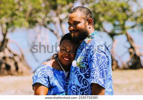Port\
Moresby, PNG - October 30, 2021: A young Melanesian couple after\
tying the knot at Papa village in Central\
Province.
