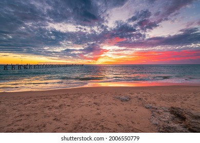 Port Noarlunga Beach And Dramatic Sunset In The Background