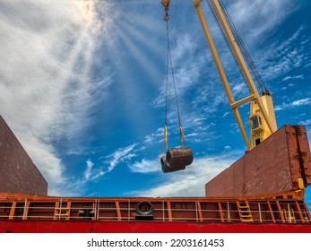 Port Operation Is Discharging Steel Wire Rod From Cargo Hold Of The Vessel.