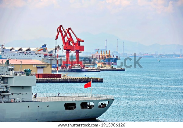 Port of Qingdao, China.\
September,14, 2020. Seagoing vessels, tugboats at the port, road\
and underway. 