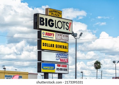 Port Richey, USA - October 4, 2021: Florida City On Gulf Coast With Sign For Big Lots Cheap Discount Store For Groceries And Home Goods On Harmony Plaza With Dollar General, Amscot And Hair Salon