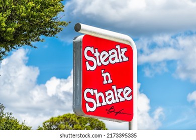 Port Richey, USA - October 4, 2021: Florida City On Gulf Coast With Sign Closeup In Red For Famous Steak N Shake Fast Food Joint Known For Steakburgers And Milkshakes In A Diner Setting